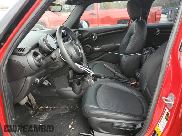 2021 MINI Hardtop 4 Door Oxford Edition z VIN WMWXU7C08M2N49721, wystawiony jako Copart lot #77983324 z przebiegiem 64 096 mil mil oraz Szkoda całkowita • Salvage title. Historia ofert i sprzedaży dostępna na DreamBid. Obrazek 7.