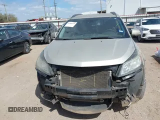 2014 Chevrolet Traverse LTZ z VIN 1GNKRJKDXEJ248849, wystawiony jako IAAI lot #41805119 z przebiegiem 171 489 mil mil oraz . Historia ofert i sprzedaży dostępna na DreamBid. Obrazek 13.
