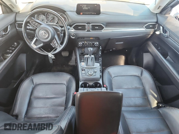2018 Mazda CX-5 Grand Touring z VIN JM3KFBDM1J0473754, wystawiony jako Copart lot #60362245 z przebiegiem 72 792 mil mil oraz Szkoda całkowita • Salvage title. Historia ofert i sprzedaży dostępna na DreamBid. Obrazek 8.