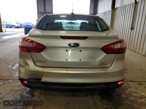 2013 Ford Focus SE z VIN 1FADP3F26DL314690, wystawiony jako Copart lot #58408575 z przebiegiem Nie podano mil oraz Szkoda całkowita • Salvage title. Historia ofert i sprzedaży dostępna na DreamBid. Obrazek 6.