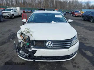 2013 Volkswagen CC Sport with VIN WVWBN7AN9DE516590, listed as a IAAI auction lot 41684586 with 153,312 mi miles. Bid and sale history available at carsss.com. Image 12.