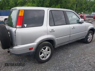 2001 Honda CR-V SE z VIN JHLRD18771C002009, wystawiony jako IAAI lot #42368432 z przebiegiem 257 664 mil mil oraz . Historia ofert i sprzedaży dostępna na DreamBid. Obrazek 4.
