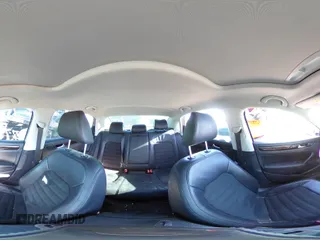 2015 Volkswagen Passat SEL Premium z VIN 1VWCV7A30FC093090, wystawiony jako Copart lot #88577655 z przebiegiem 63 000 mil mil oraz Szkoda całkowita • Salvage title. Historia ofert i sprzedaży dostępna na DreamBid. Obrazek 12.