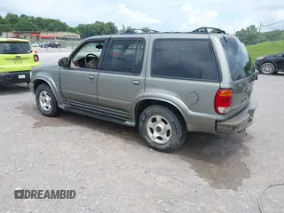 2000 Ford Explorer z VIN 1FMZU85P9YUB30553, wystawiony jako IAAI lot #42503777 z przebiegiem 209 062 mil mil oraz . Historia ofert i sprzedaży dostępna na DreamBid. Obrazek 3.
