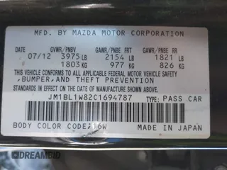 2012 Mazda 3 i Grand Touring with VIN JM1BL1W82C1694787, listed as a IAAI auction lot 41979890 with 237,675 mi miles and . Bid and sale history available at DreamBid. Image 9.
