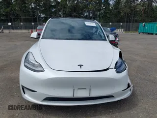 2022 Tesla Model Y Long Range z VIN 7SAYGDEE9NF494901, wystawiony jako IAAI lot #42310520 z przebiegiem 62 515 mil mil oraz . Historia ofert i sprzedaży dostępna na DreamBid. Obrazek 12.