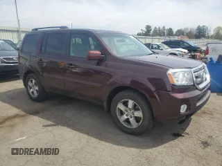 2009 Honda Pilot EX with VIN 5FNYF48469B011311, listed as a Copart auction lot 53736235 with 213,133 mi miles and Salvage Title. Bid and sale history available at DreamBid. Image 4.