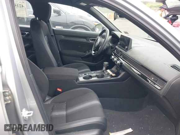 2023 Honda Civic Sport with VIN 2HGFE2F55PH501595, listed as a IAAI auction lot 42355942 with 8,924 mi miles and . Bid and sale history available at DreamBid. Image 5.