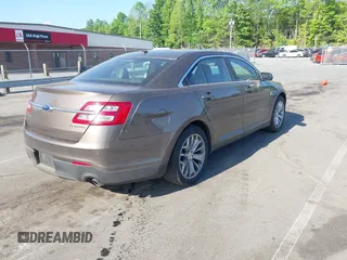 2016 Ford Taurus Limited z VIN 1FAHP2F81GG109548, wystawiony jako IAAI lot #42177871 z przebiegiem 168 611 mil mil oraz . Historia ofert i sprzedaży dostępna na DreamBid. Obrazek 4.