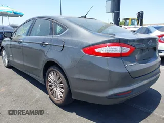 2015 Ford Fusion SE Hybrid with VIN 3FA6P0LU4FR305908, listed as a IAAI auction lot 42539627 with 91,467 mi miles and . Bid and sale history available at DreamBid. Image 3.