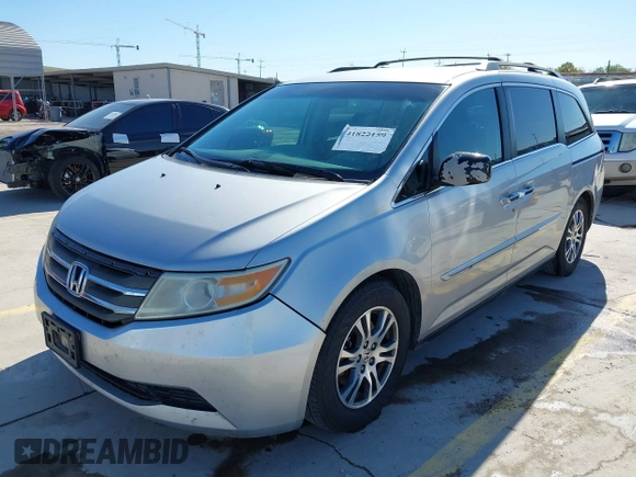 2012 Honda Odyssey EX with VIN 5FNRL5H48CB131881, listed as a IAAI auction lot 41822159 with 354,718 mi miles and . Bid and sale history available at DreamBid. Image 18.