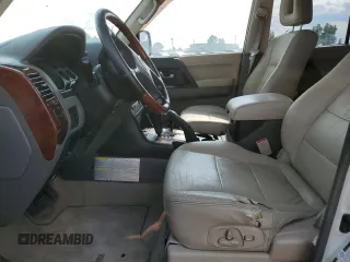 2005 Mitsubishi Montero Limited z VIN JA4MW51S75J600118, wystawiony jako Copart lot #59516485 z przebiegiem 260 701 mil mil oraz Czysty tytuł • Clean title. Historia ofert i sprzedaży dostępna na DreamBid. Obrazek 7.