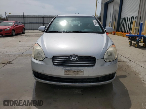 2006 Hyundai Accent GLS with VIN KMHCN46C46U048752, listed as a Copart auction lot 52930035 with 143,688 mi miles and Salvage title. Bid and sale history available at DreamBid. Image 5.