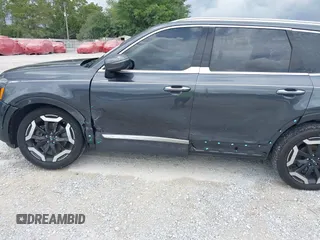 2023 Kia Telluride S with VIN 5XYP64GC0PG386895, listed as a IAAI auction lot 42365625 with 41,588 mi miles and . Bid and sale history available at DreamBid. Image 6.