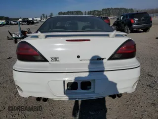 1999 Pontiac Grand Am GT with VIN 1G2NW12EXXM754842, listed as a Copart auction lot 46940335 with 124,886 mi miles and Salvage Title. Bid and sale history available at carsss.com. Image 6.
