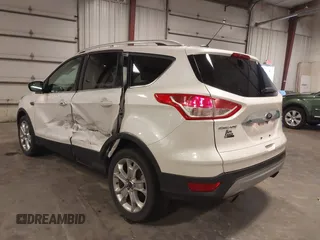 2016 Ford Escape Titanium with VIN 1FMCU9J99GUA61848, listed as a IAAI auction lot 42300324 with 51,692 mi miles and . Bid and sale history available at DreamBid. Image 3.