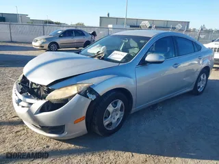 2009 Mazda Mazda6 i Sport with VIN 1YVHP81A895M20622, listed as a IAAI auction lot 41834764 with 182,058 mi miles. Bid and sale history available at carsss.com. Image 2.