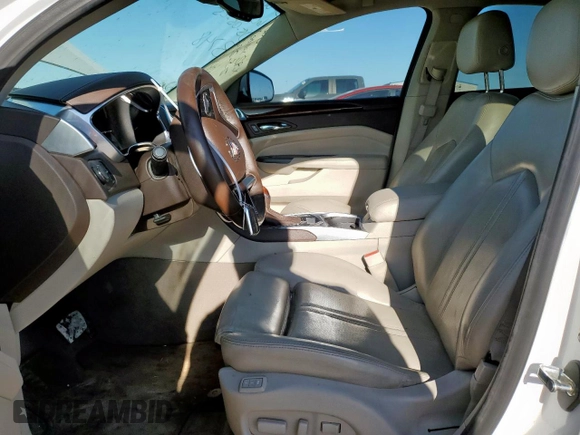 2016 Cadillac SRX Performance Collection with VIN 3GYFNCE37GS573748, listed as a Copart auction lot 57506005 with 136,605 mi miles and Salvage title. Bid and sale history available at DreamBid. Image 7.