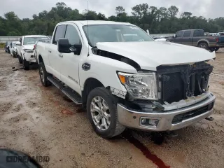 2016 Nissan Titan XD PRO-4X with VIN 1N6BA1F42GN505201, listed as a Copart auction lot 74371164 with 102,235 mi miles and Salvage Title. Bid and sale history available at carsss.com. Image 4.