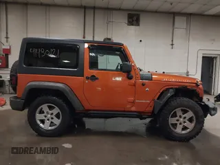 2011 Jeep Wrangler Rubicon with VIN 1J4BA6D15BL624268, listed as a IAAI auction lot 41430121 with 142,433 mi miles and . Bid and sale history available at carsss.com. Image 14.