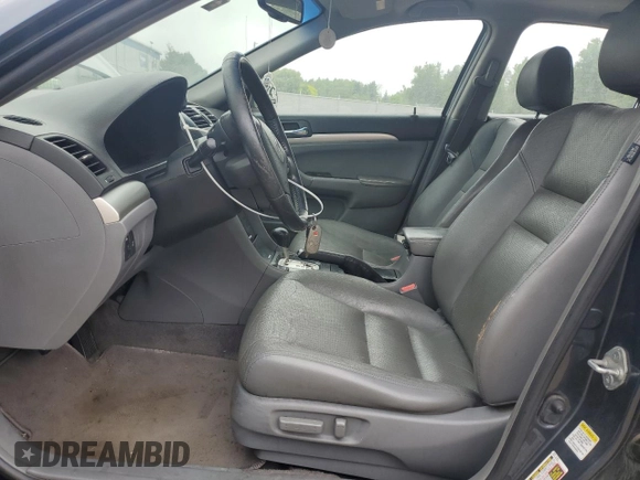 2007 Acura TSX with VIN JH4CL968X7C009091, listed as a Copart auction lot 60789755 with 303,504 mi miles and Salvage title. Bid and sale history available at DreamBid. Image 7.