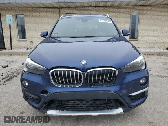 2017 BMW X1 xDrive28i with VIN WBXHT3C30H5F71011, listed as a Copart auction lot 51018645 with 83,203 mi miles and Clean Title. Bid and sale history available at carsss.com. Image 5.