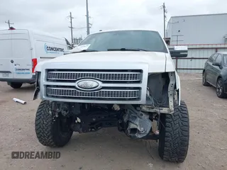 2012 Ford F-150 XL z VIN 1FTFW1CF0CFC75514, wystawiony jako IAAI lot #41931877 z przebiegiem 164 220 mil mil oraz . Historia ofert i sprzedaży dostępna na DreamBid. Obrazek 13.