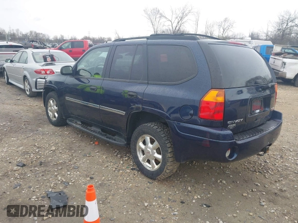 2007 GMC Envoy SLE with VIN 1GKDT13S372158038, listed as a IAAI auction lot 42103078 with 119,954 mi miles. Bid and sale history available at carsss.com. Image 3.