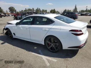2023 Genesis G70 3.3T with VIN KMTG54TE3PU124511, listed as a Copart auction lot 74132184 with 2,534 mi miles and Salvage Title. Bid and sale history available at DreamBid. Image 2.