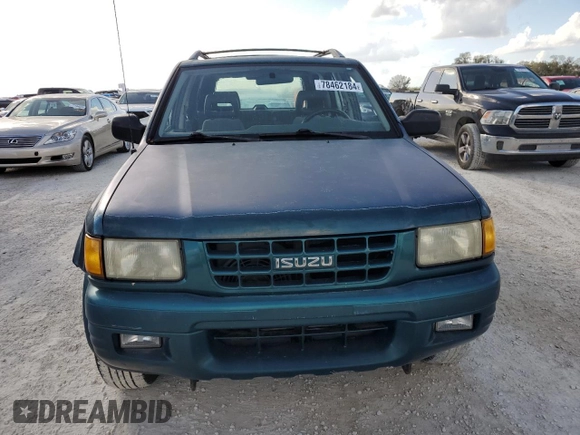 1999 Isuzu Rodeo S with VIN 4S2CK58W0X4378100, listed as a Copart auction lot 78462184 with Not provided miles and Salvage title. Bid and sale history available at DreamBid. Image 5.