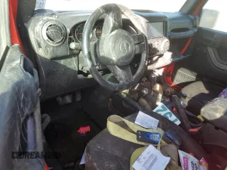 2018 Jeep Wrangler JK Unlimited Sport S with VIN 1C4BJWDG2JL899265, listed as a Copart auction lot 85165474 with 102,619 mi miles and Salvage Title. Bid and sale history available at carsss.com. Image 8.
