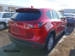 2015 Mazda CX-5 Sport z VIN JM3KE2BE7F0516869, wystawiony jako IAAI lot #41866488 z przebiegiem 131 237 mil mil oraz . Historia ofert i sprzedaży dostępna na DreamBid. Obrazek 4.