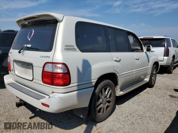 2000 Lexus LX 470 with VIN JT6HT00W2Y0106774, listed as a Copart auction lot 74762004 with Not Provided miles and Salvage Title. Bid and sale history available at DreamBid. Image 3.