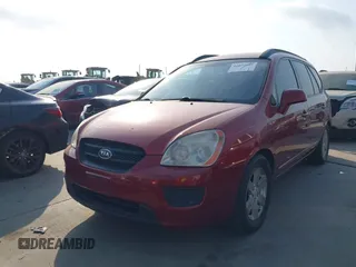 2008 Kia Rondo LX with VIN KNAFG526887128782, listed as a IAAI auction lot 42072865 with 125,882 mi miles. Bid and sale history available at carsss.com. Image 2.