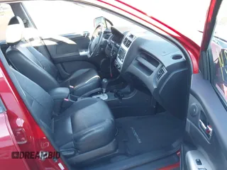 2009 Kia Sportage LX with VIN KNDJE723997634014, listed as a IAAI auction lot 41452224 with 148,643 mi miles. Bid and sale history available at carsss.com. Image 5.