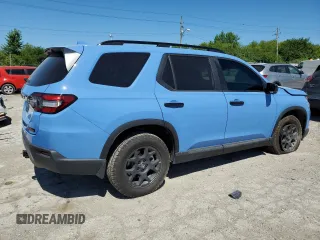 2023 Honda Pilot TrailSport with VIN 5FNYG1H64PB054670, listed as a Copart auction lot 59756484 with 14,132 mi miles and Salvage Title. Bid and sale history available at carsss.com. Image 3.