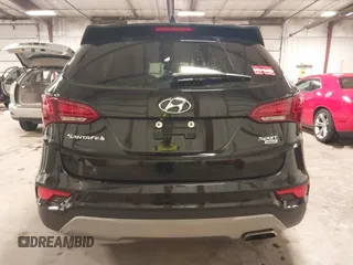2017 Hyundai Santa Fe 2.4L with VIN 5NMZUDLBXHH041621, listed as a IAAI auction lot 42194586 with 91,012 mi miles and . Bid and sale history available at DreamBid. Image 17.
