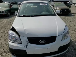 2009 Kia Rio LX with VIN KNADE223896456292, listed as a Copart auction lot 54990605 with 61,220 mi miles and Salvage Title. Bid and sale history available at DreamBid. Image 13.