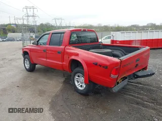 2003 Dodge Dakota Sport with VIN 1D7HG38X63S212434, listed as a IAAI auction lot 42030739 with 181,098 mi miles. Bid and sale history available at carsss.com. Image 3.