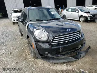 2013 MINI Cooper Countryman with VIN WMWZB3C58DWM07395, listed as a Copart auction lot 52193165 with 147,892 mi miles and Salvage Title. Bid and sale history available at carsss.com. Image 12.