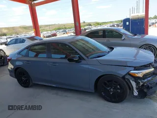 2025 Honda Civic Sport with VIN 2HGFE2F54SH542602, listed as a IAAI auction lot 42068927 with 7,110 mi miles and . Bid and sale history available at DreamBid. Image 14.