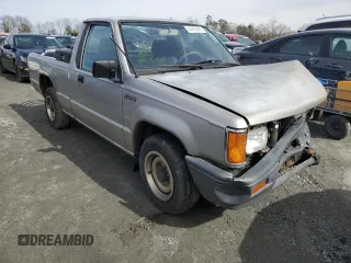 1994 Mitsubishi Mighty Max z VIN JA7LS21GXRP013712, wystawiony jako Copart lot #44893085 z przebiegiem 287 441 mil mil oraz Szkody całkowita. Historia ofert i sprzedaży dostępna na DreamBid. Obrazek 4.