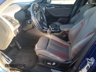 2023 BMW X4 M z VIN 5YM23EC08P9P65351, wystawiony jako Copart lot #77847174 z przebiegiem 16 197 mil mil oraz Szkoda całkowita • Salvage title. Historia ofert i sprzedaży dostępna na DreamBid. Obrazek 7.