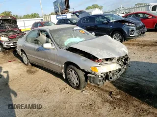 1997 Honda Accord Value with VIN 1HGCD5684VA168495, listed as a Copart auction lot 71716984 with 202,854 mi miles and Salvage Title. Bid and sale history available at DreamBid. Image 11.