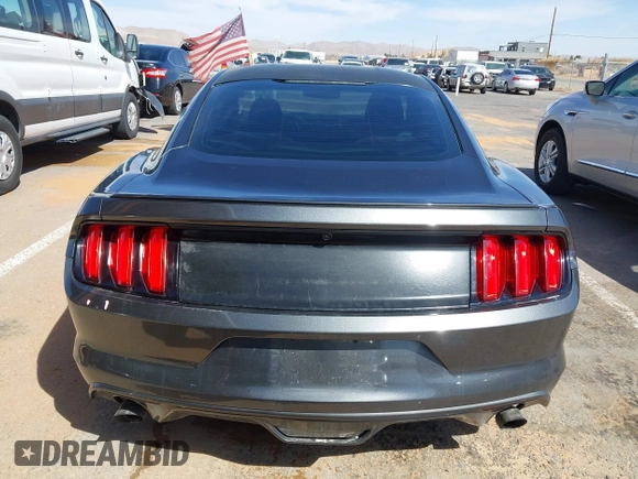 2015 Ford Mustang V6 with VIN 1FA6P8AM5F5318400, listed as a IAAI auction lot 41812625 with 97,728 mi miles and . Bid and sale history available at DreamBid. Image 16.