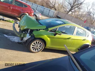 2018 Ford Fiesta Titanium z VIN 3FADP4FJ2JM142861, wystawiony jako IAAI lot #41860660 z przebiegiem 20 820 mil mil oraz . Historia ofert i sprzedaży dostępna na DreamBid. Obrazek 15.