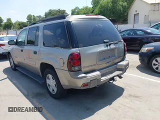 2003 Chevrolet TrailBlazer EXT LT with VIN 1GNES16S736233526, listed as a IAAI auction lot 42193747 with 197,471 mi miles. Bid and sale history available at carsss.com. Image 3.