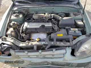 2004 Hyundai Accent GL with VIN KMHCG45C44U531828, listed as a Copart auction lot 86428134 with 92,054 mi miles and Salvage Title. Bid and sale history available at carsss.com. Image 12.