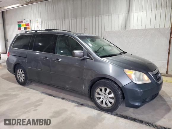 2010 Honda Odyssey EX-L with VIN 5FNRL3H76AB113634, listed as a Copart auction lot 53881045 with 214,478 mi miles and Salvage Title. Bid and sale history available at carsss.com. Image 4.