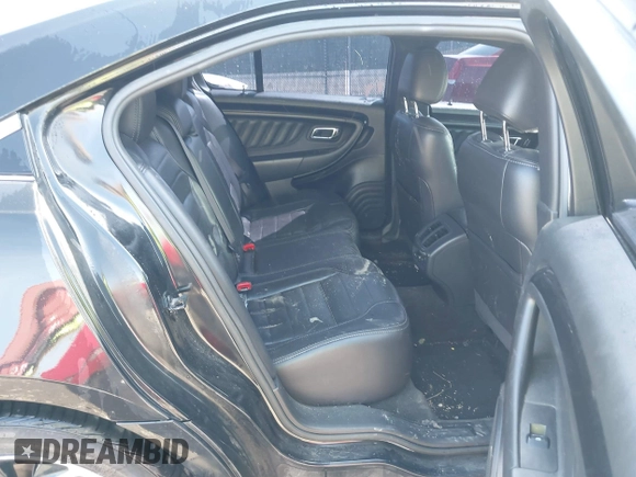 2013 Ford Taurus SHO z VIN 1FAHP2KT9DG164190, wystawiony jako IAAI lot #41743345 z przebiegiem 191 568 mil mil oraz . Historia ofert i sprzedaży dostępna na DreamBid. Obrazek 8.